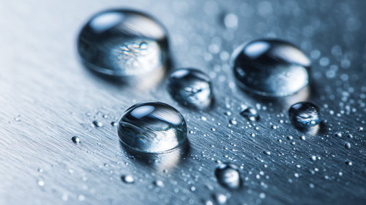 Lubricant droplets on stainless steel surface